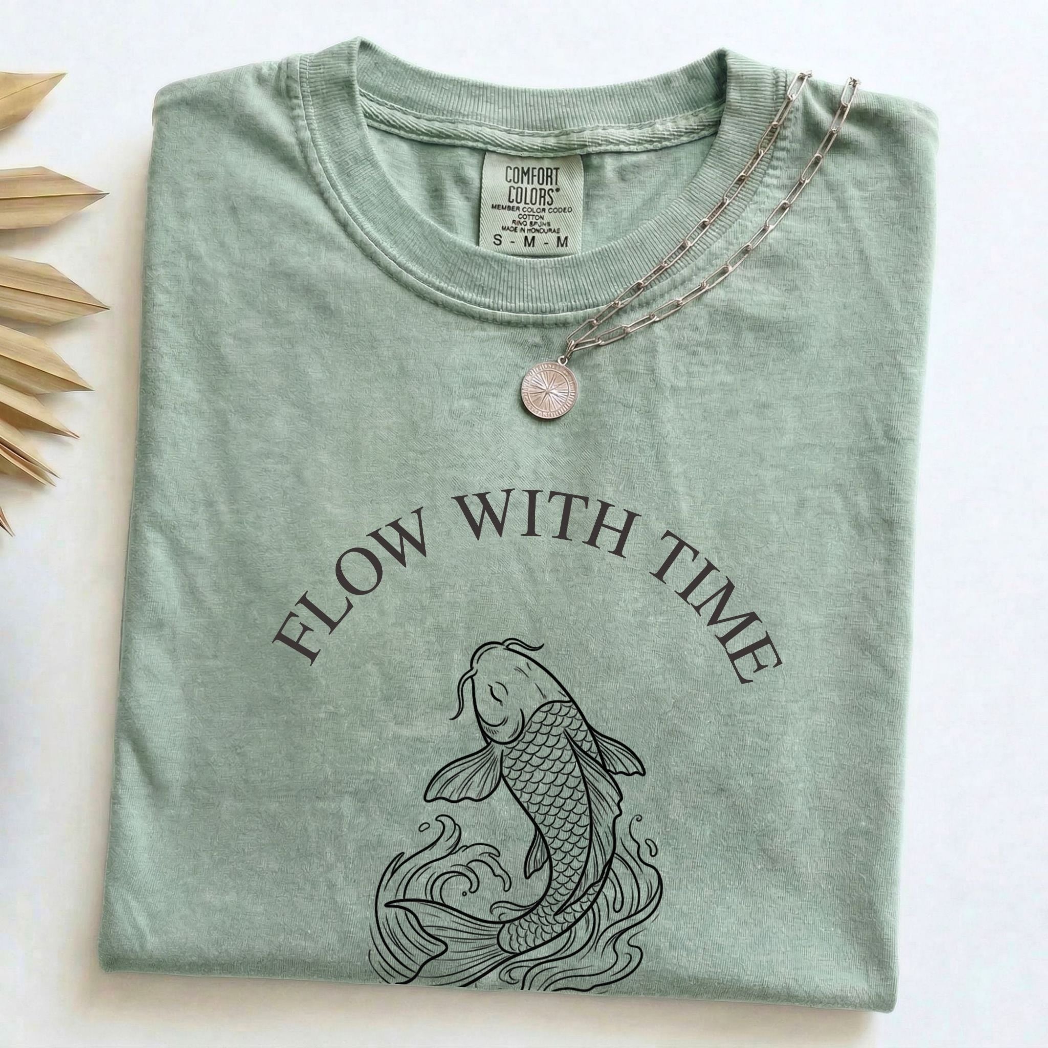Folded Bay Comfort Colors t-shirt with the Flow With Time koi fish design and necklace styling
