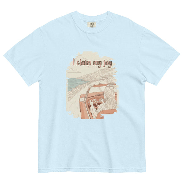 I Claim My Joy graphic t-shirt in sky blue with illustrated woman driving convertible on coastal road – mindful self love gift for her