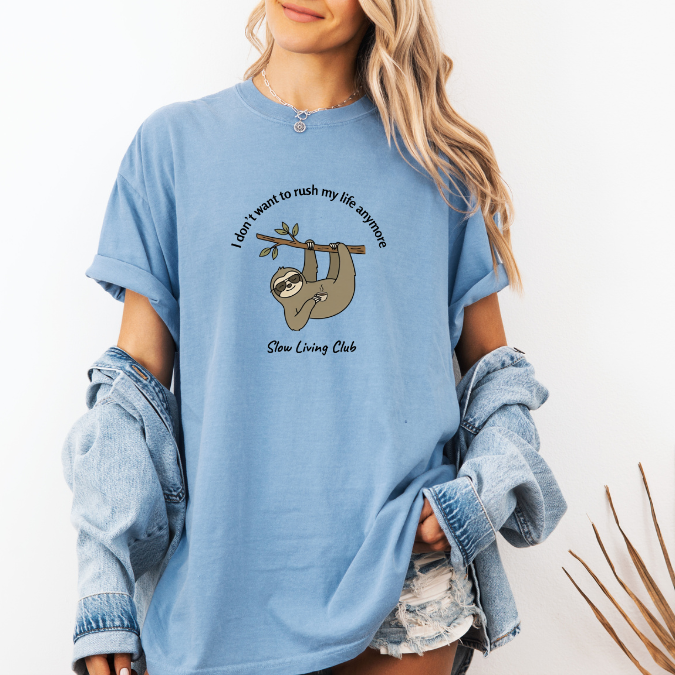 Washed denim Comfort Colors tee with cute sloth illustration and I don’t want to rush my life anymore text