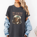 Pepper Comfort Colors graphic tee with a vintage-style illustration of a woman leaning out of a car window and the phrase “I’m exactly where I need to be.”