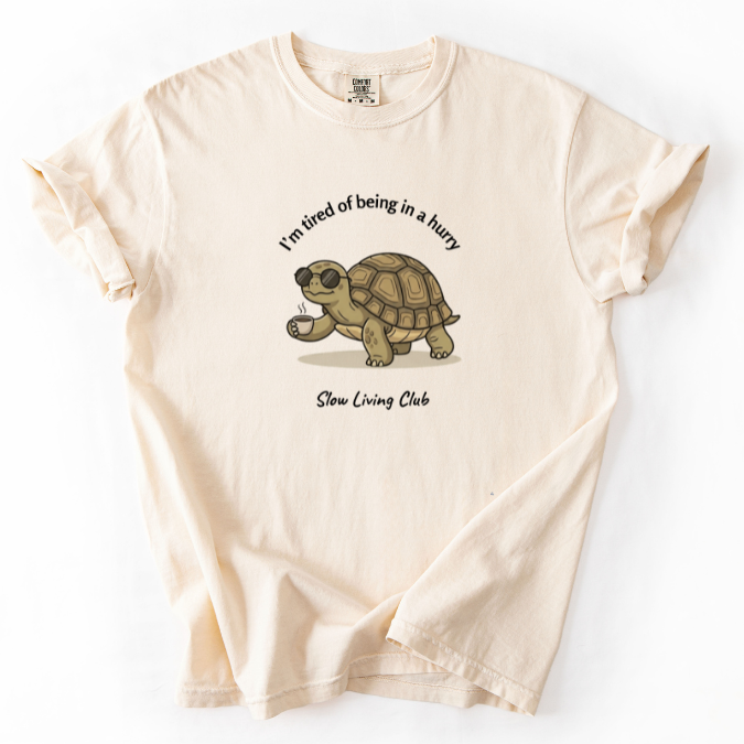 Ivory Comfort Colors t-shirt with turtle coffee graphic and the phrase I’m Tired of Being in a Hurry from the Slow Living Club collection.