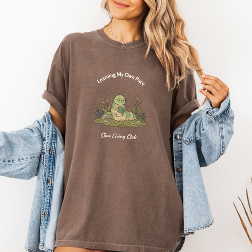 Espresso Slow Living Club tee with soft caterpillar personal growth design.