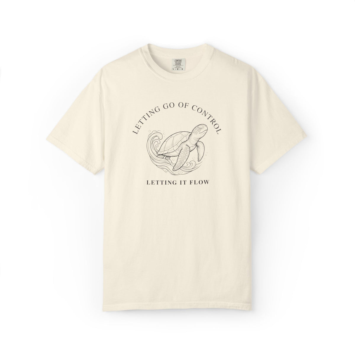 Ivory Comfort Colors 1717 tee featuring a detailed sea turtle and Letting It Flow quote