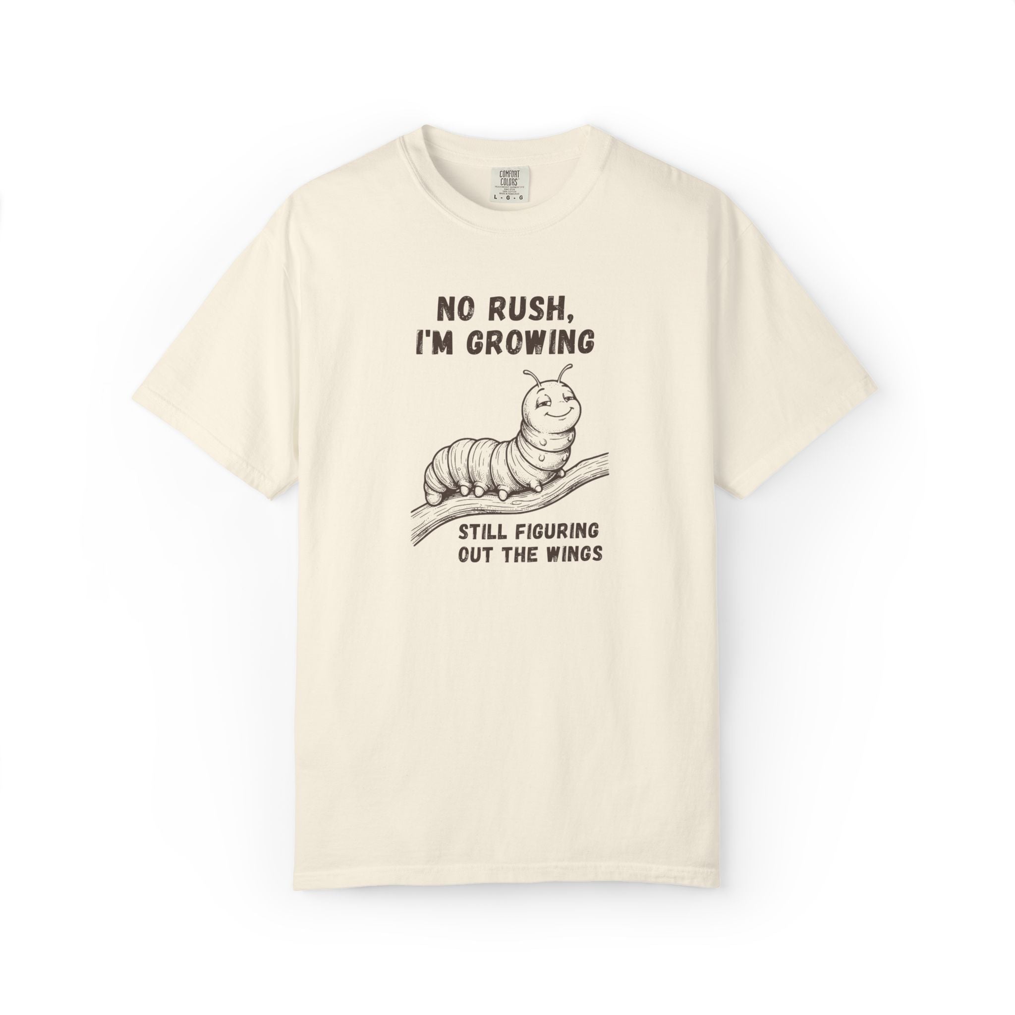 No Rush I'm Growing caterpillar Comfort Colors tee in Ivory, flat lay product photo