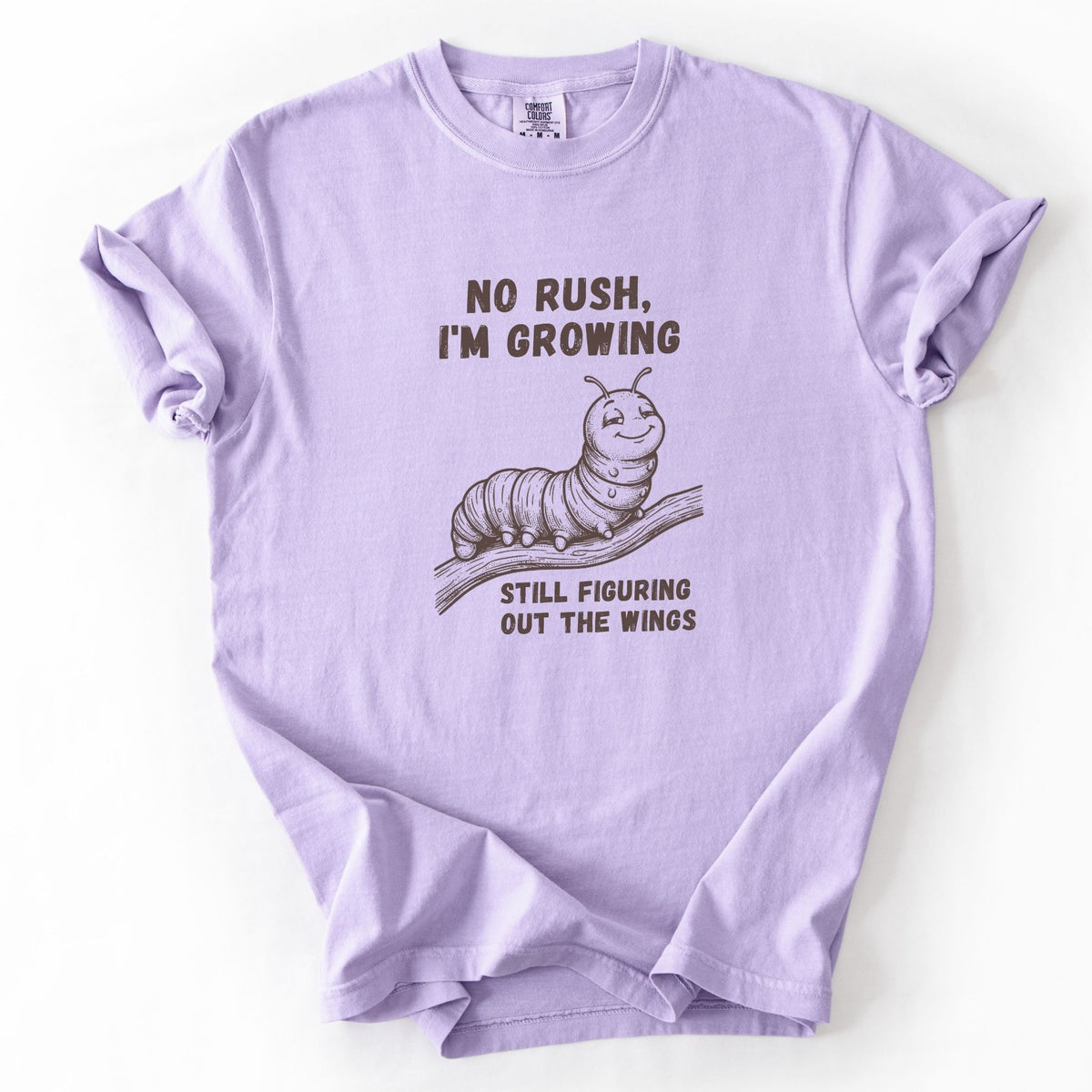 No Rush I'm Growing caterpillar Comfort Colors tee in Orchid lavender, flat lay product photo