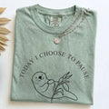 Folded Bay Comfort Colors t-shirt with the Today I Choose to Pause otter design and necklace styling