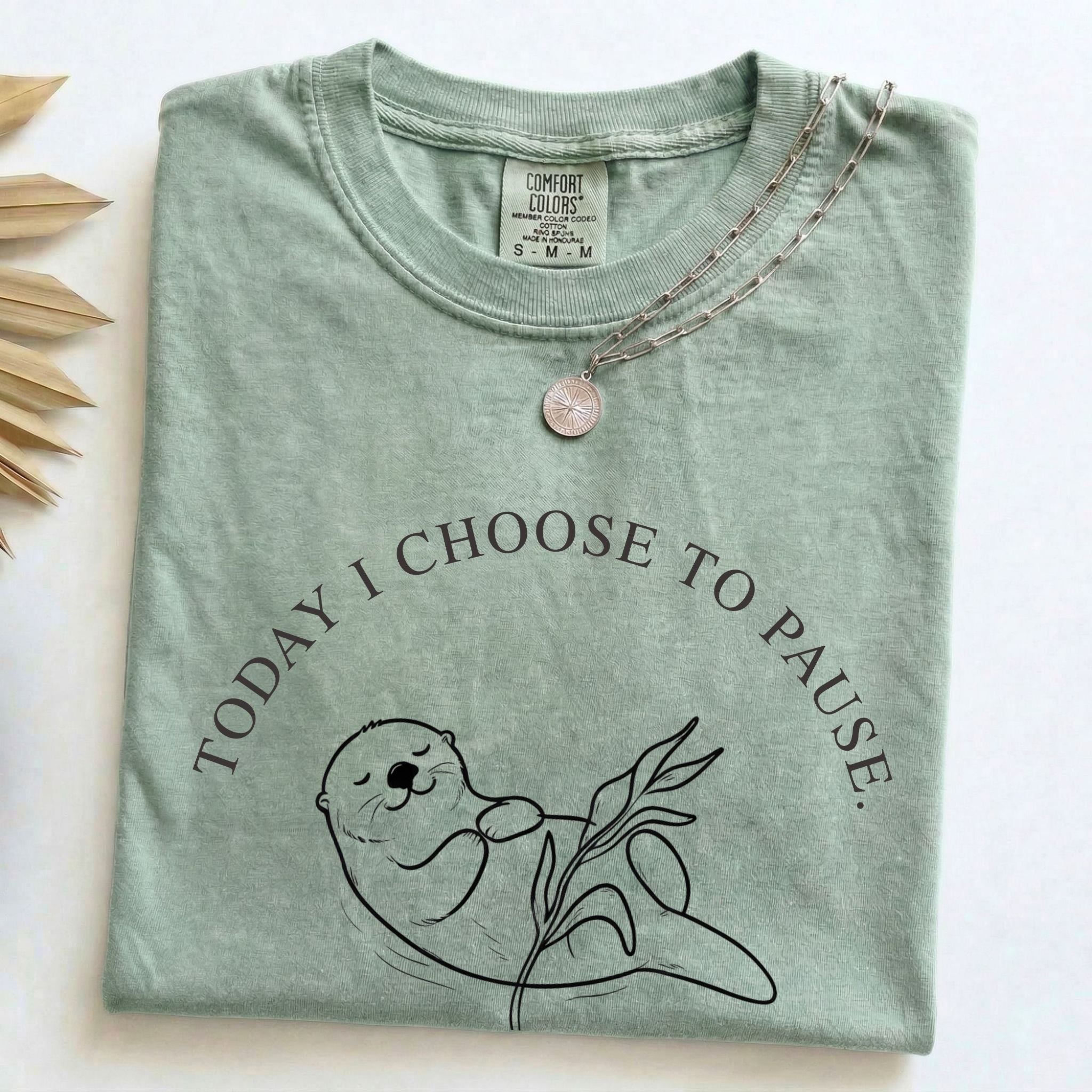 Folded Bay Comfort Colors t-shirt with the Today I Choose to Pause otter design and necklace styling