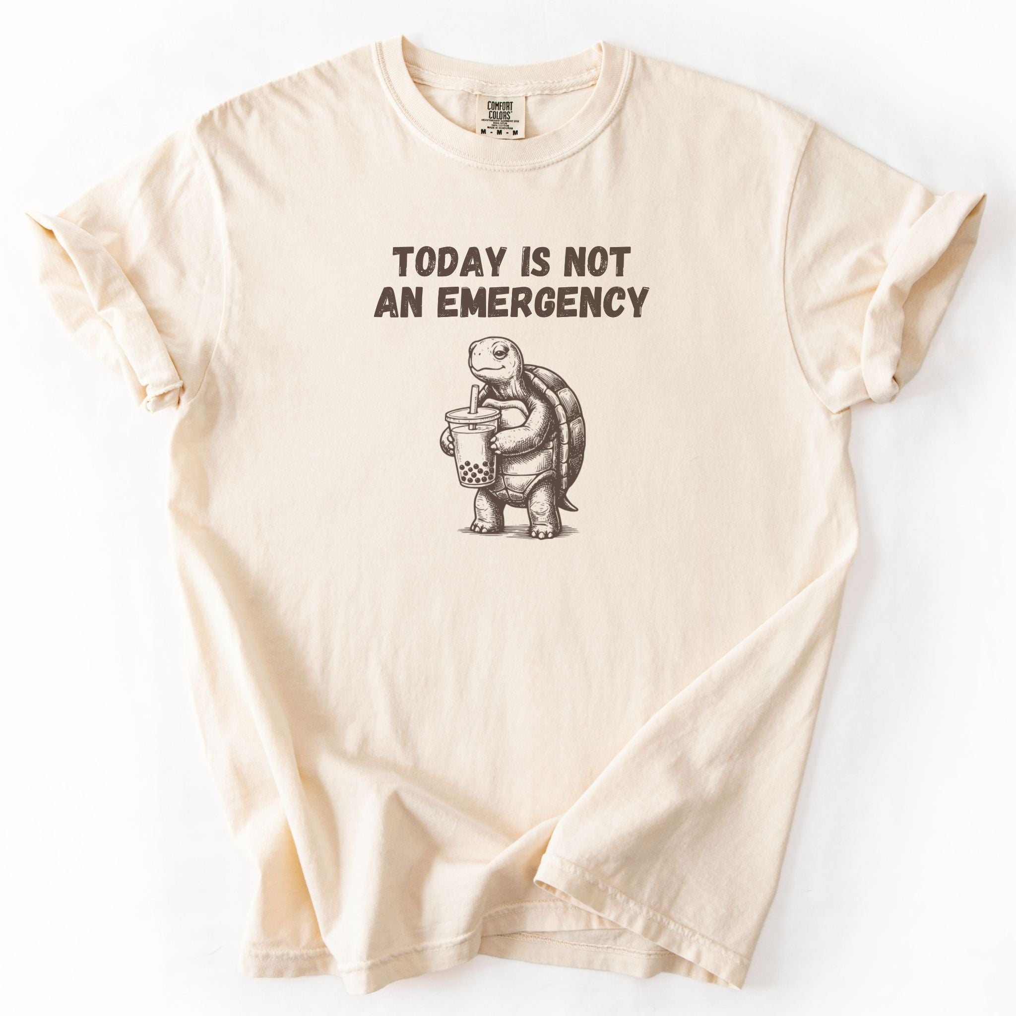 Today Is Not an Emergency turtle Comfort Colors tee in Ivory, flat lay product photo