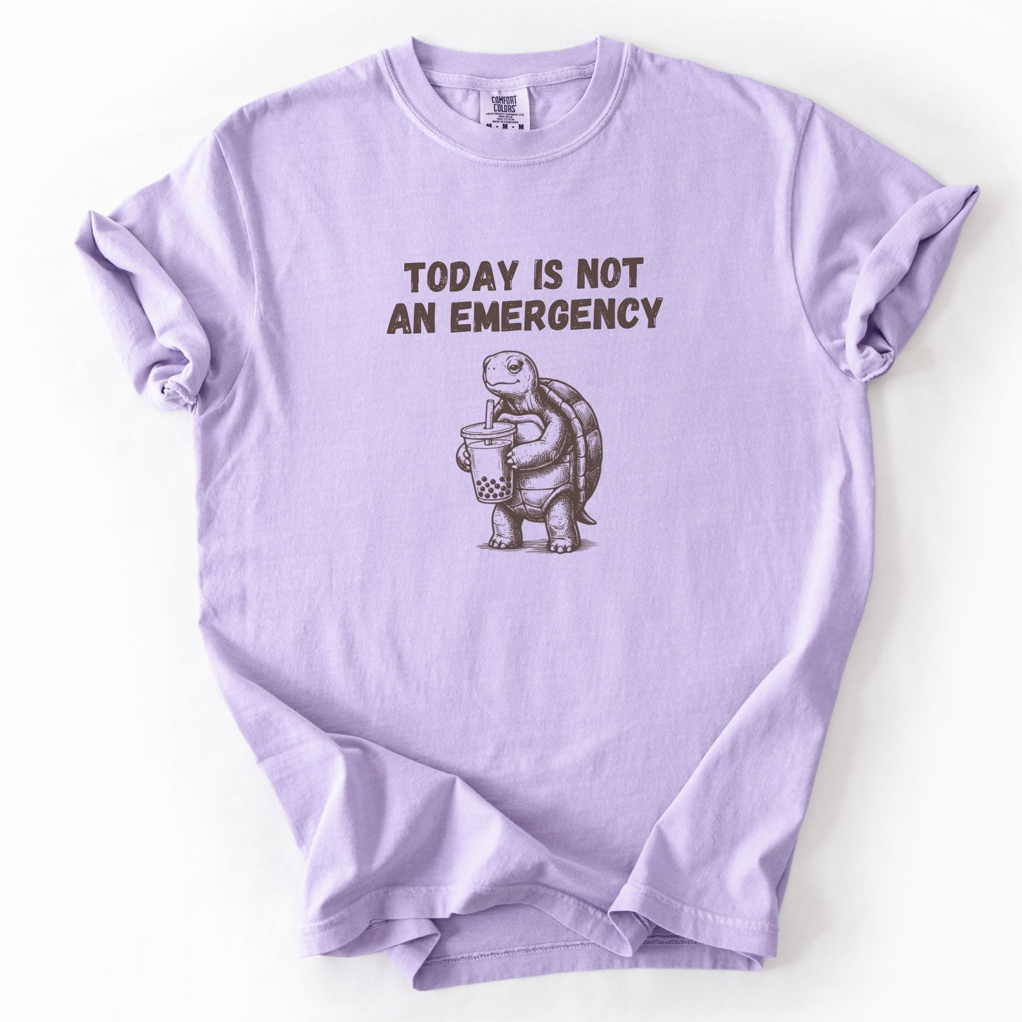 Today Is Not an Emergency turtle Comfort Colors tee in Orchid lavender, flat lay product photo