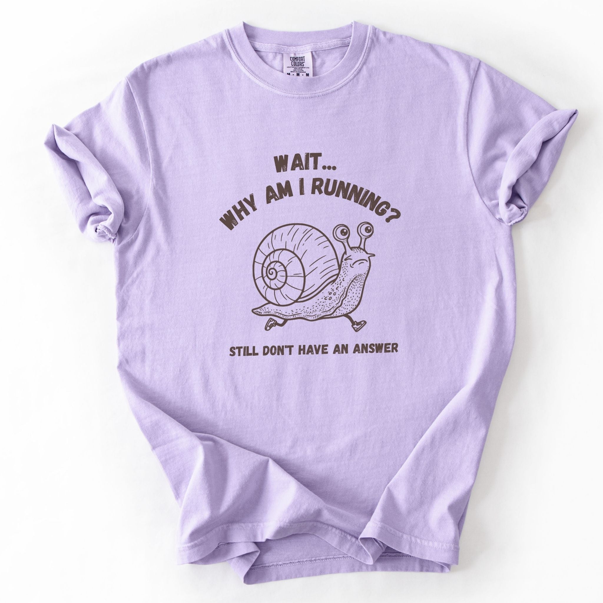 Wait Why Am I Running snail Comfort Colors tee in Orchid lavender, flat lay product photo